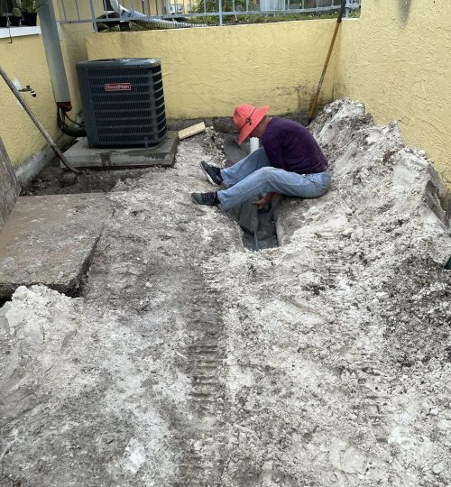 Handyman repairing deck in Groveland